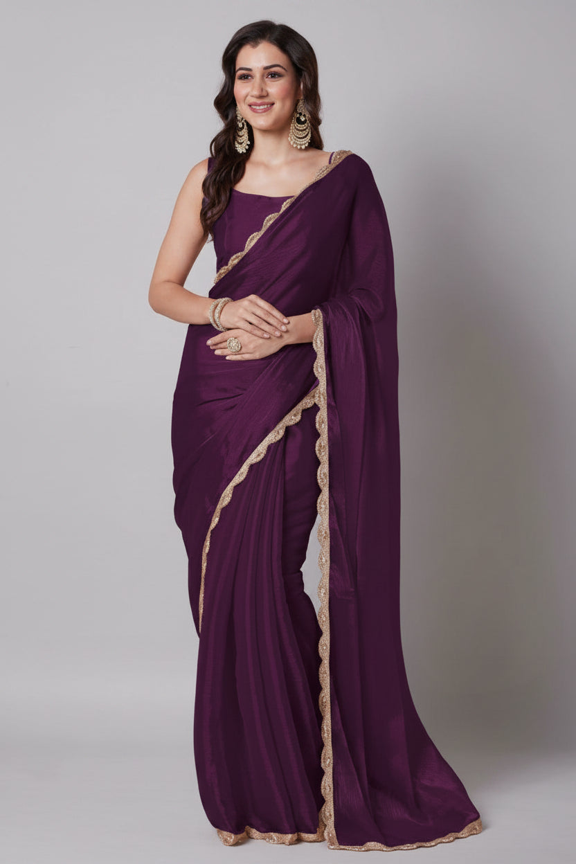 Woman wearing a purple saree with gold border on a beige background